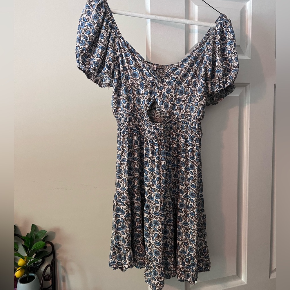 Blue floral flowy mini dress with cut out detail in front